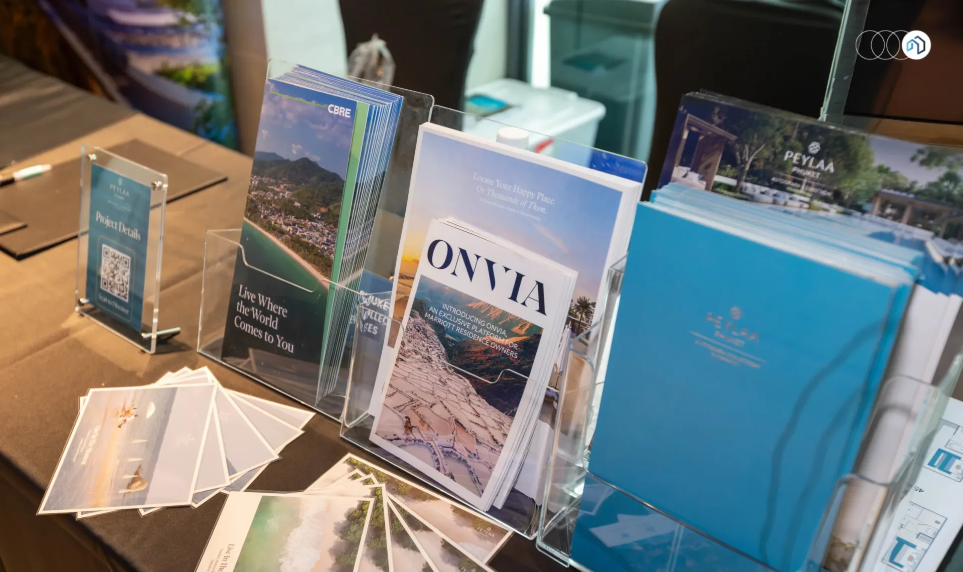 PEYLAA Phuket brochures and project details on display at Nestopa Property Pulse Phuket 2026
